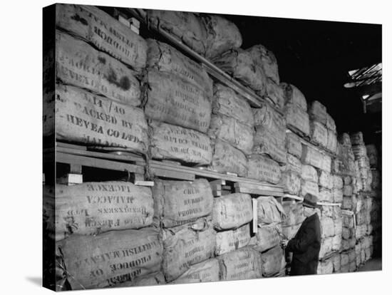 Crude Rubber Stacked Three Stories High in Warehouse, U.S. Strategic Materials Stockpile-Ed Clark-Premier Image Canvas