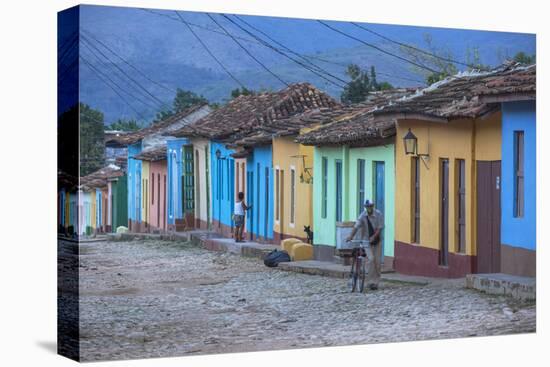 Cuba, Trinidad, a Man Selling Sandwiches Up a Colourful Street in Historical Center-Jane Sweeney-Premier Image Canvas