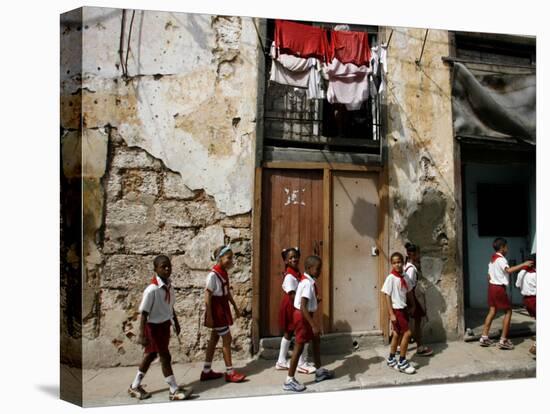 Cuban Students Walk Along a Street in Old Havana, Cuba, Monday, October 9, 2006-Javier Galeano-Premier Image Canvas