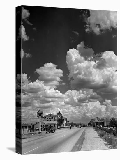 Cumulus Clouds Billowing over Texaco Gas Station along a Stretch of Highway US 66-Andreas Feininger-Premier Image Canvas