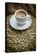 Cup of Espresso on a Sack with Unroasted Coffee Beans-Bernd Wittelsbach-Premier Image Canvas