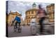 Cyclists Passing the Sheldonian Theatre, Oxford, Oxfordshire, England, United Kingdom, Europe-John Alexander-Premier Image Canvas