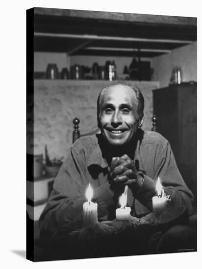 Dancer Jose Limon Seated at Candle Lit Table at His Home-Gjon Mili-Premier Image Canvas