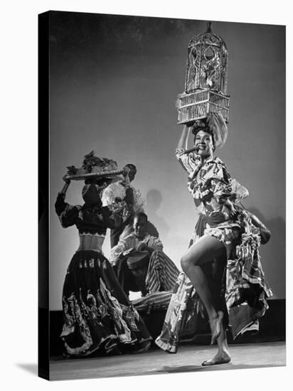 Dancer Katherine Dunham Dancing Barefoot with Cigar in Her Mouth and Birdcage Balanced on Her Head-Gjon Mili-Premier Image Canvas