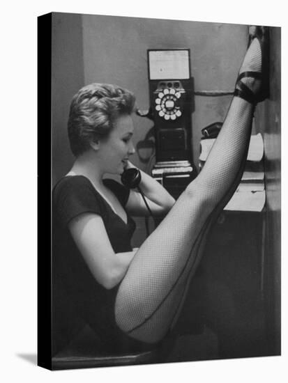 Dancer Mary Ellen Terry Talking with Her Legs Up in Telephone Booth-Gordon Parks-Premier Image Canvas