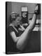 Dancer Mary Ellen Terry Talking with Her Legs Up in Telephone Booth-Gordon Parks-Premier Image Canvas
