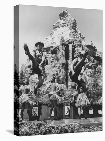 Dancers Do Matterhorn Act in Front of Artificial Slope at Disneyland-Ralph Crane-Premier Image Canvas