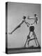 Danish Gymnasts Erik Hansen Followed by John Thomsen Do High Thief Jump as Team Member Braces Buck-Gjon Mili-Premier Image Canvas