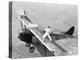 Daredevils Playing Tennis on a Biplane-null-Premier Image Canvas