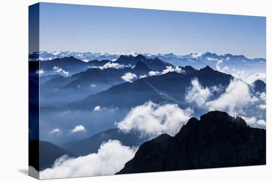 Dark Bergsilhouetten and Light Clouds in Tyrol-Rolf Roeckl-Premier Image Canvas