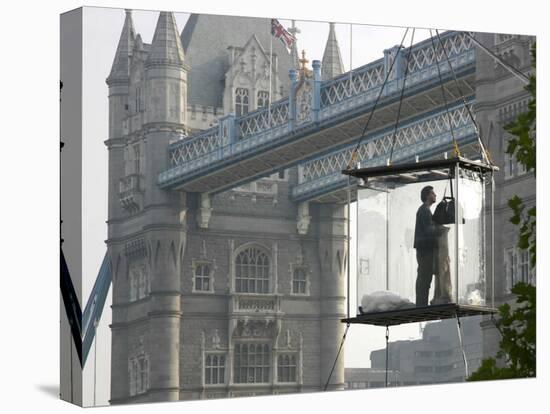 David Blaine, the American Illusionist and Street Magician in Front of Tower Bridge in London-null-Premier Image Canvas