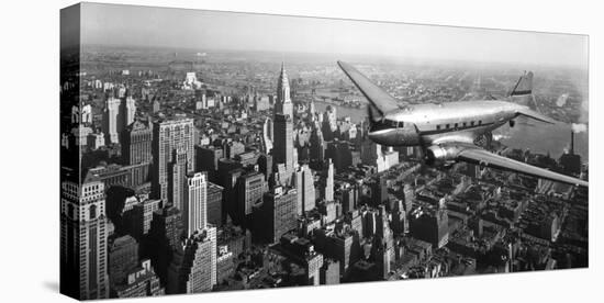 DC-4 over Manhattan, NYC-null-Stretched Canvas