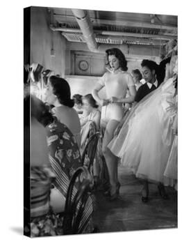 Debutante Actress Tina L. Meyer Changing Clothes Backstage in Dressing Room-Nina Leen-Premier Image Canvas
