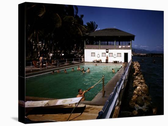 December 1946: Guests Swimming in the Pool at Myrtle Bank Hotel in Kingston, Jamaica-Eliot Elisofon-Premier Image Canvas