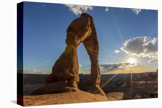 Delicate Arch with sun and clouds at golden hour, Arches National Park, Moab, Grand County, Utah, U-Francesco Vaninetti-Premier Image Canvas