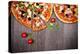 Delicious Italian Pizzas Served on Wooden Table-Jag_cz-Premier Image Canvas