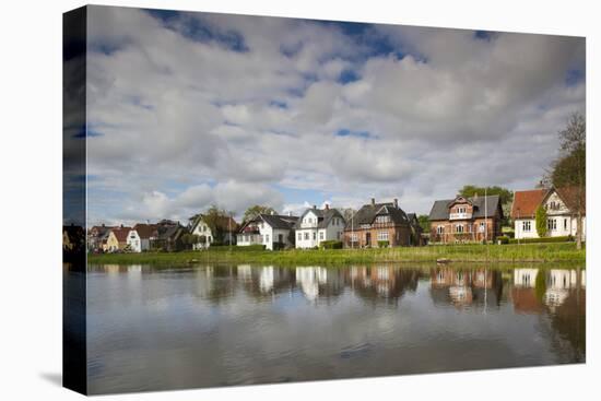 Denmark, Jutland, Ribe, Buildings by the Ribe River-Walter Bibikow-Premier Image Canvas