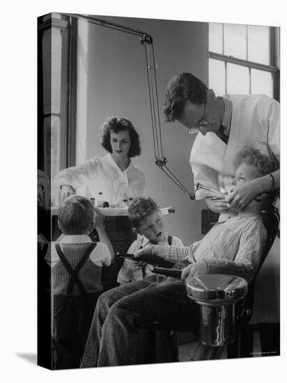 Dentist Examining a Young Boy-Nina Leen-Premier Image Canvas