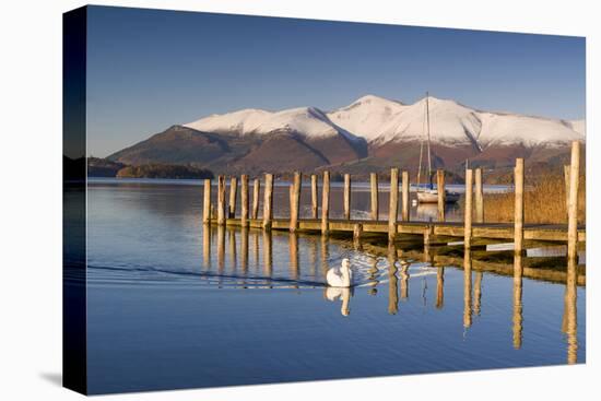 Derwent Water and snow capped Skiddaw from Lodor Hotel Jetty, Borrowdale, Lake District National Pa-John Potter-Premier Image Canvas