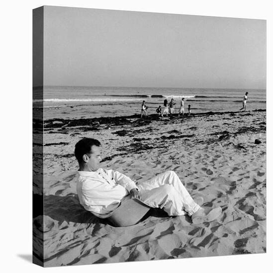 Designer Charles Eames Sitting on a Beach Near His Home-Peter Stackpole-Premier Image Canvas