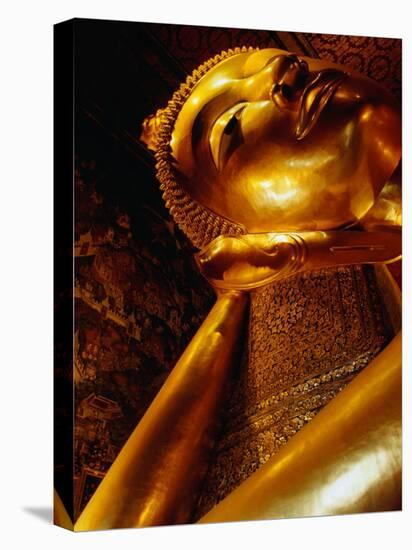 Detail of Reclining Buddha's Head at Wat Pho, Bangkok, Thailand-Ryan Fox-Premier Image Canvas