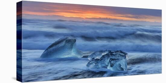 Diamond ice chards from calving icebergs on black sand beach, Jokulsarlon, south Iceland-Chuck Haney-Premier Image Canvas