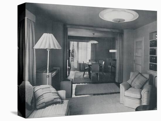 'Dining and living room, divided only by heavy curtains in an attractive modern weave', 1942-Unknown-Premier Image Canvas