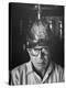 Director Billy Wilder in His Hollywood Office Wearing German Helmet-Gjon Mili-Premier Image Canvas