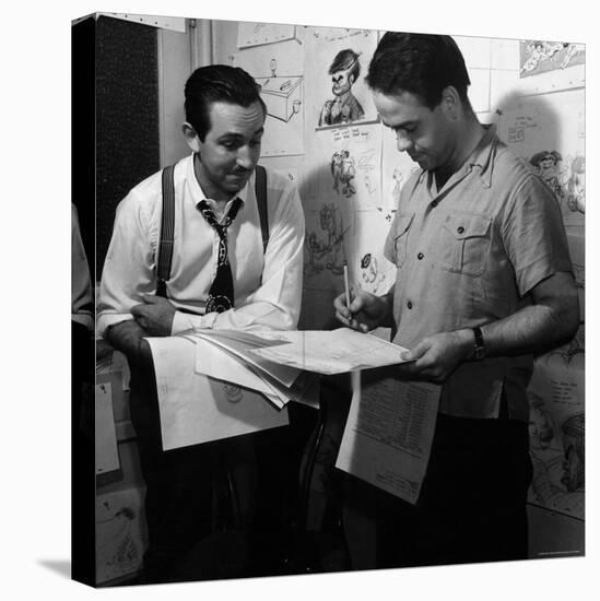 Director Walt Disney Looking over Sketches from His Latest Picture "Pinocchio."-Peter Stackpole-Premier Image Canvas
