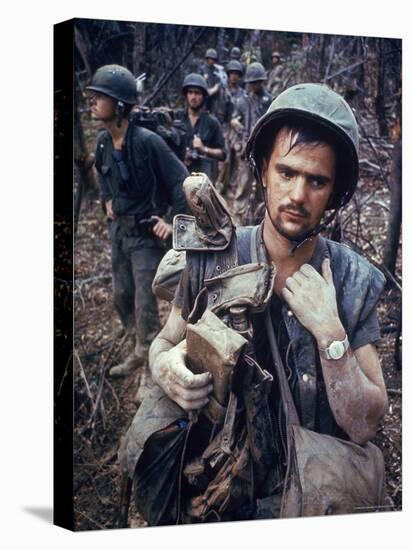 Dirty, Exhausted Looking US Marine on Patrol with His Squad Near the DMZ During the Vietnam War-Larry Burrows-Premier Image Canvas