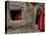 Displaced Girls Smile as They Look Out from a Shanty, in a Refugee Camp in Kabul, Afghanistan-null-Premier Image Canvas