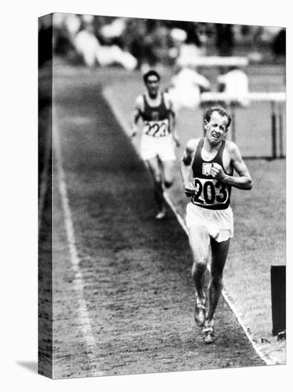 Distance Champion Emil Zatopek as He Set a New 10,000 Meter Record During the Olympic Games-Frank Scherschel-Premier Image Canvas