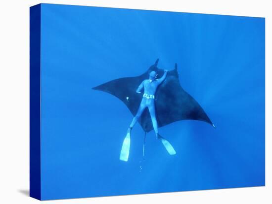 Diver Holds on to Giant Manta Ray, Mexico-Jeffrey Rotman-Premier Image Canvas