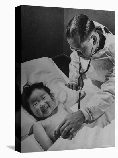 Doctor Examining Giggling Patient Recovering from Cold-Hansel Mieth-Premier Image Canvas