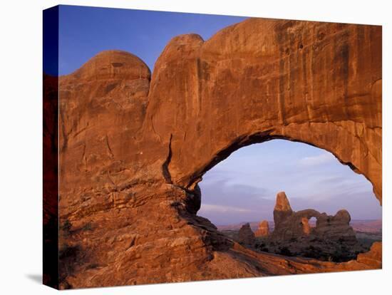 Double Arch Frames Turret Arch at Dawn, Arches National Park, Utah, USA-Paul Souders-Premier Image Canvas