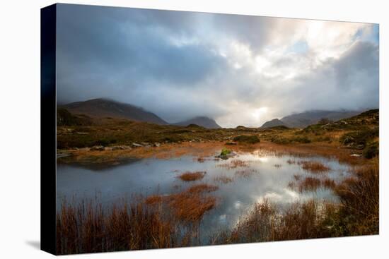 Dramatic Light Reflected in a Small Lochan at Sligachan, Isle of Skye Scotland UK-Tracey Whitefoot-Premier Image Canvas