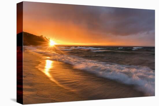 Dramatic sunset light along Miners Beach in Pictured Rocks National Lakeshore, Michigan, USA-Chuck Haney-Premier Image Canvas