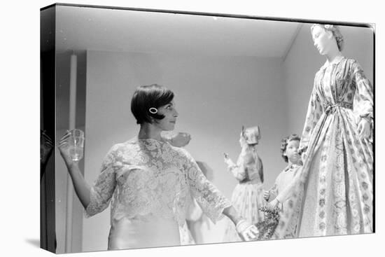 Drinking Guest Looking at a Display at the Met Fashion Ball, New York, New York, November 1960-Walter Sanders-Premier Image Canvas