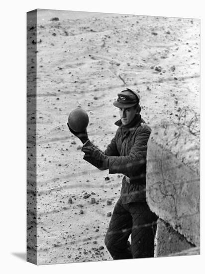 East German Border Guard Tossing Ball over Berlin Wall after German boy accidently threw it over-Paul Schutzer-Premier Image Canvas