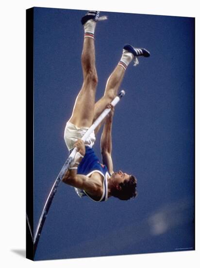 East Germany's Wolfgang Nordwig in Action During Pole Vaulting Event at the Summer Olympics-John Dominis-Premier Image Canvas