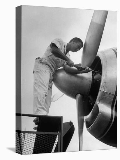 Eastern Airline Employees Working on the Maintaining an Aircraft's Engine-Ralph Morse-Premier Image Canvas
