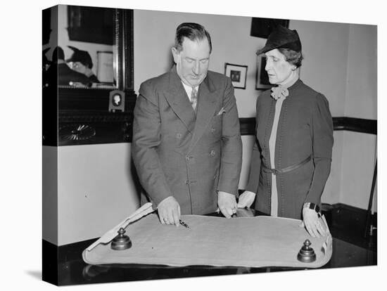 Edwin H. Dressel and Nellie Tayloe Ross discuss the United States gold reserve, 1937-Harris & Ewing-Premier Image Canvas