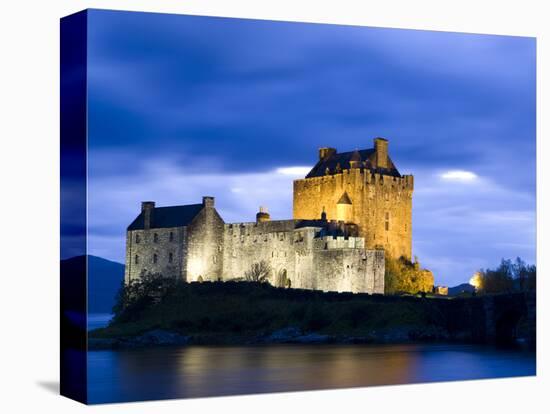 Eilean Donan Castle Floodlit Against Deep Blue Twilight Sky and Water of Loch Duich, Near Dornie, K-Lee Frost-Premier Image Canvas