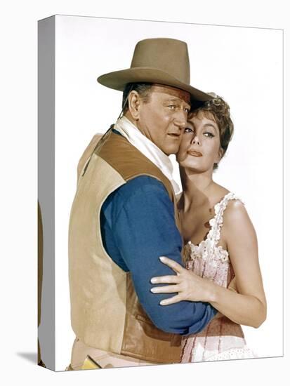 EL DORADO, 1967 directed by HOWARD HAWKS John Wayne and Charlene Holt (photo)-null-Stretched Canvas
