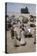 Elizabeth Taylor Shakes Hands with an Unidentified Woman on the Set of 'Giant', Marfa, Texas, 1956-Allan Grant-Premier Image Canvas