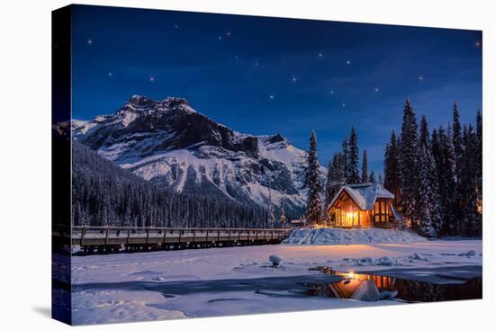 Emerald Lake Lodge in Banff, Canada during winter with snow and mountains at night with starry sky-David Chang-Premier Image Canvas
