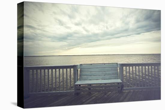 Empty Bench along the Boardwalk Overlooking the Currituck Sound in Duck in the Outer Banks of North-pdb1-Premier Image Canvas