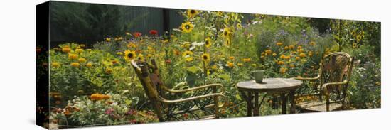 Empty Chairs and a Table in a Garden, Taos, New Mexico, USA-null-Premier Image Canvas