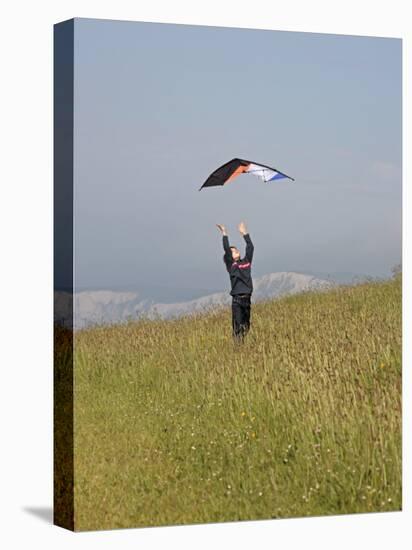 England, Isle of Wight; Boy Flying a Kite on the Downs Near Compton Bay in Southwest of the Island-Will Gray-Premier Image Canvas