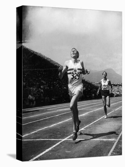 England's Dr. Roger Bannister Beating Australia's Mile Record Holder John Landy-Ralph Morse-Premier Image Canvas